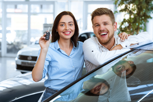 Couple buying a new car